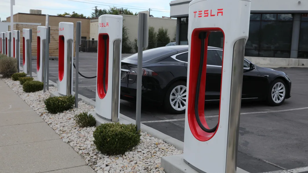 Tesla Layoffs Threaten Biden's EV Charging Plans and Highway Electrification