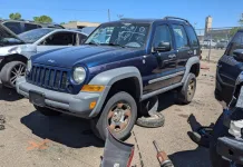 "Rare Find: First-Generation Jeep Liberty Found in Junkyard with Manual Transmission"