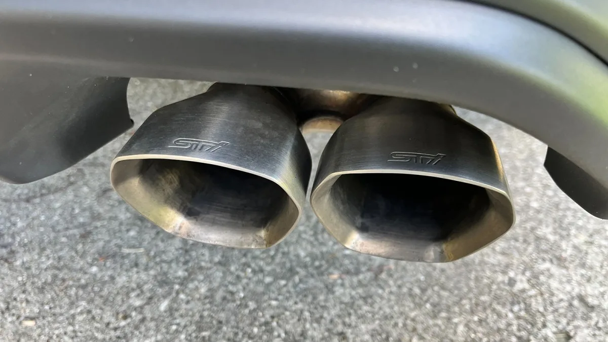 "The Subaru STI Muffler: A Mixed Bag of Noise and Performance"